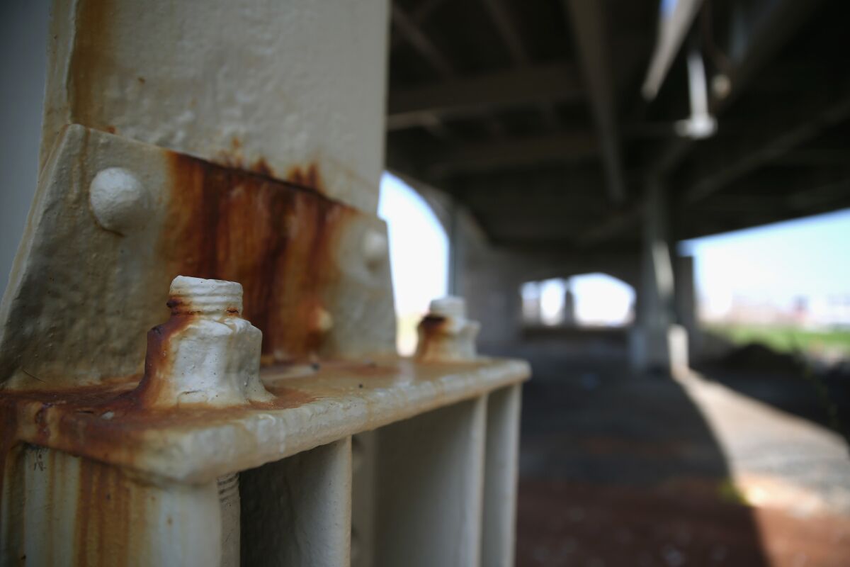Rust corrodes nuts under the Frederick Douglass Memorial Bridge in Washington on April 13. The bridge is one of 61,000 bridges across the country that the Department of Transportation says are structurally deficient and in need of repair.