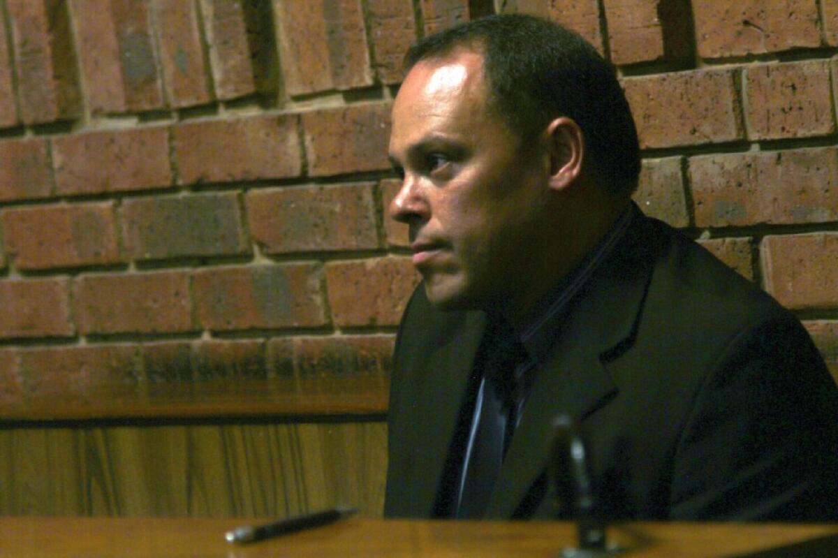 Hilton Botha was replaced as the lead investigator in the murder case against Oscar Pistorius when it was found he had attempted murder charges brought against him.