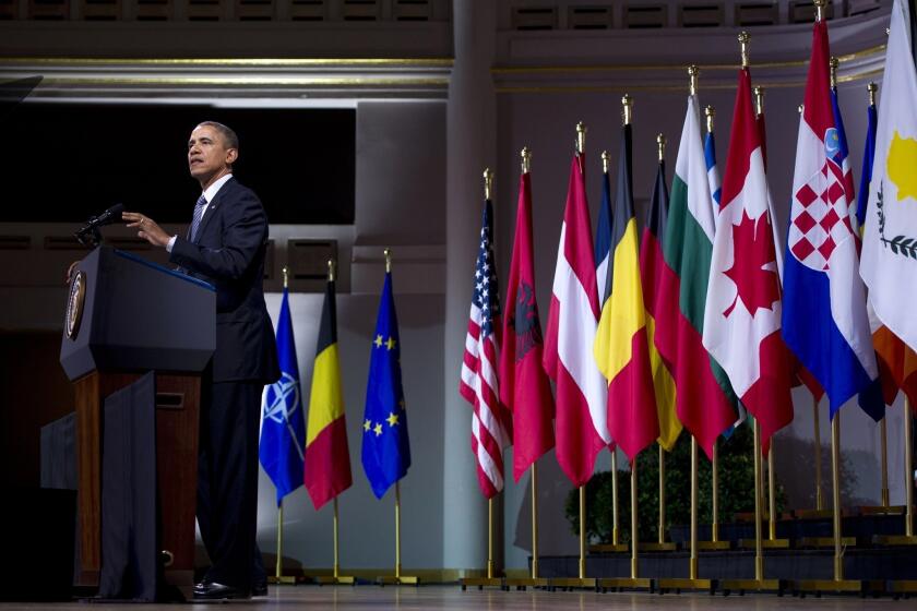 President Obama delivers a speech at the Palais des Beaux-Arts in Brussels.