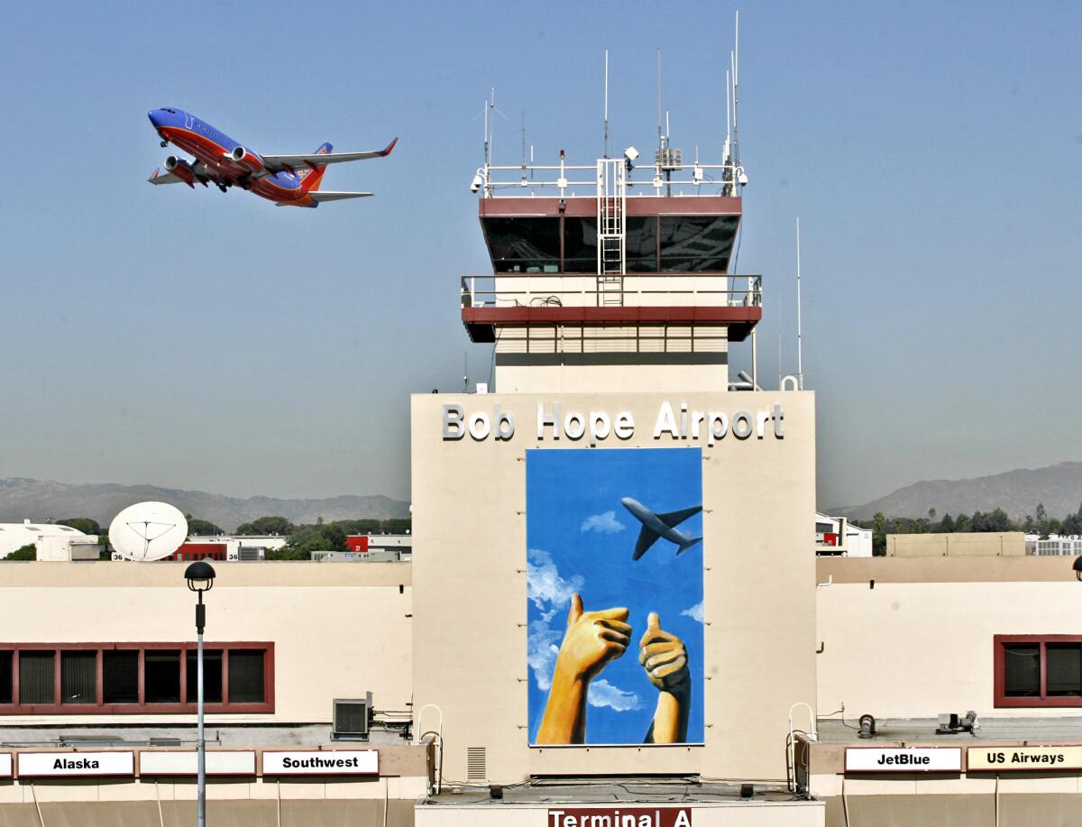 A Southwest Airlines jet takes off from Bob Hope Airport in Burbank. Officials from the city of Burbank and the Burbank-Glendale-Pasadena Airport Authority will travel to Washington, D.C., next week to discuss setting a mandatory nighttime curfew at the airfield with federal officials.