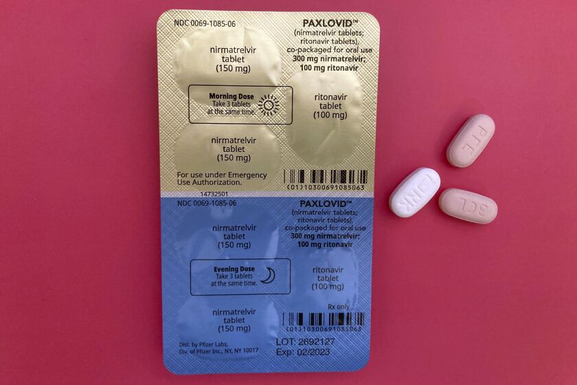 The anti-viral drug Paxlovid is displayed in New York.