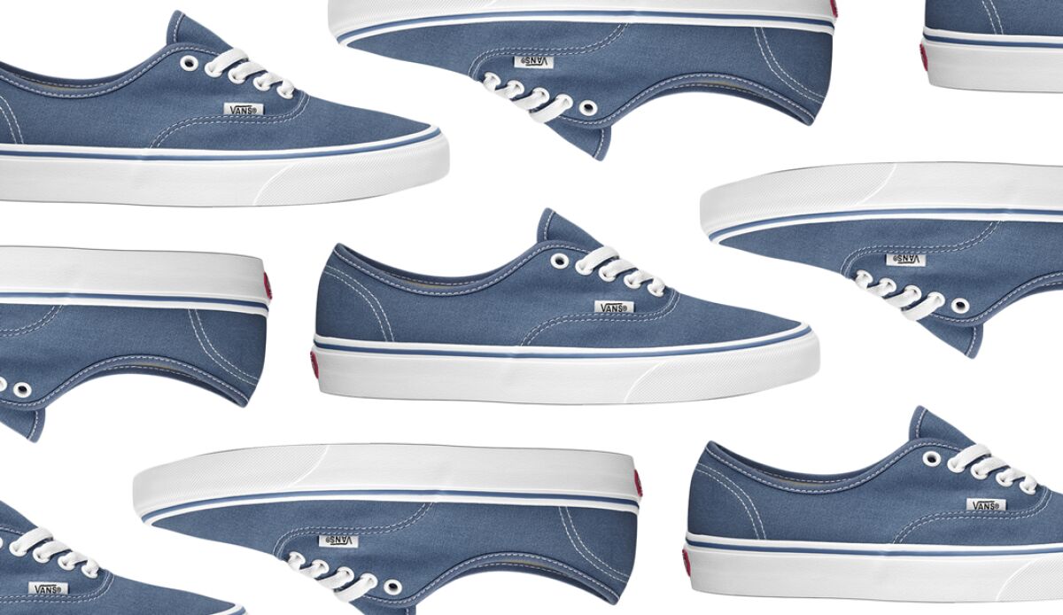 A photo of a navy blue lace-up sneaker.