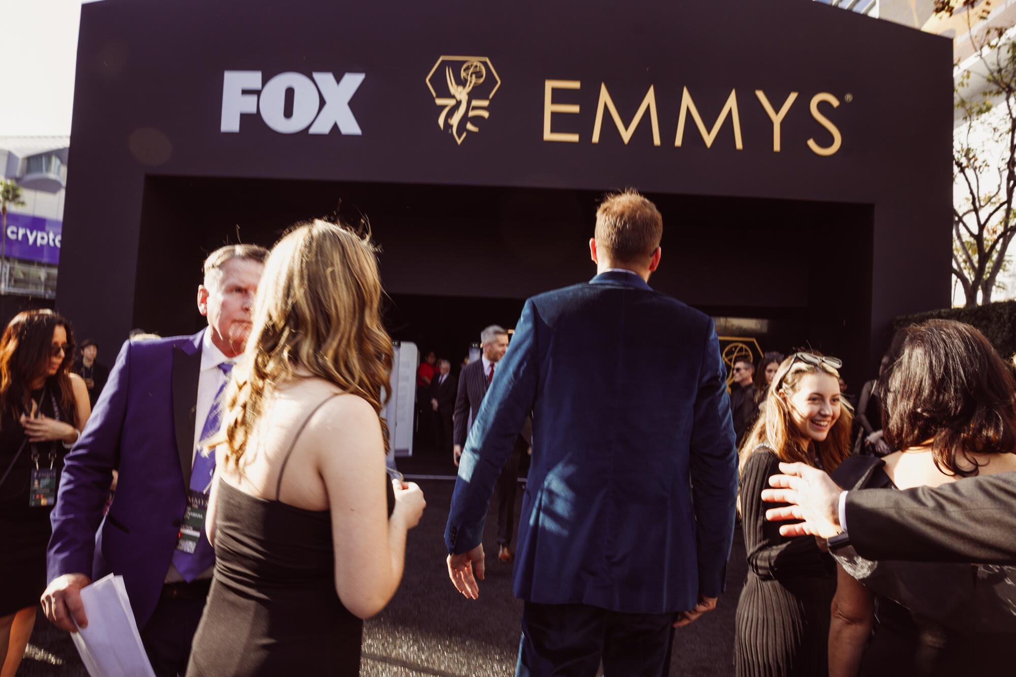 Ronald Gladden approaches the Emmys red carpet.