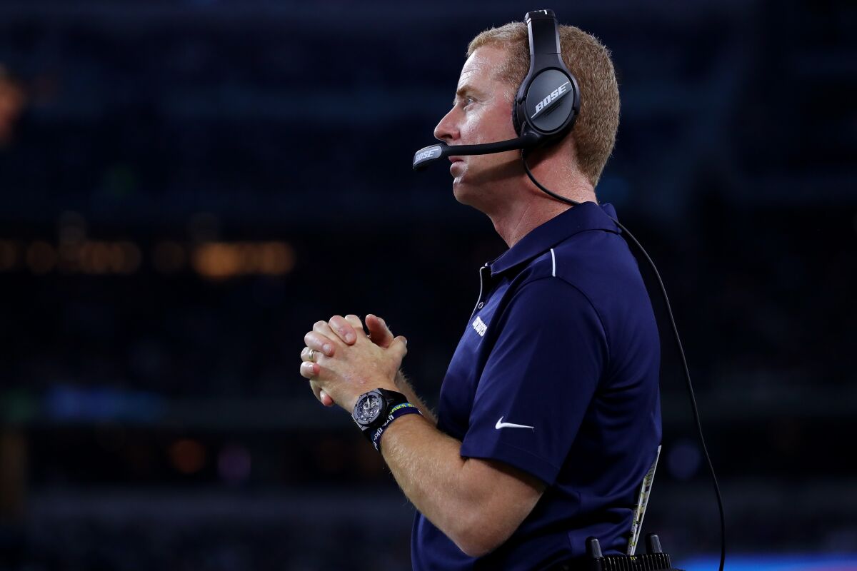 Dallas Cowboys coach Jason Garrett watches from the sideline during Sunday's win over the Washington Redskins.