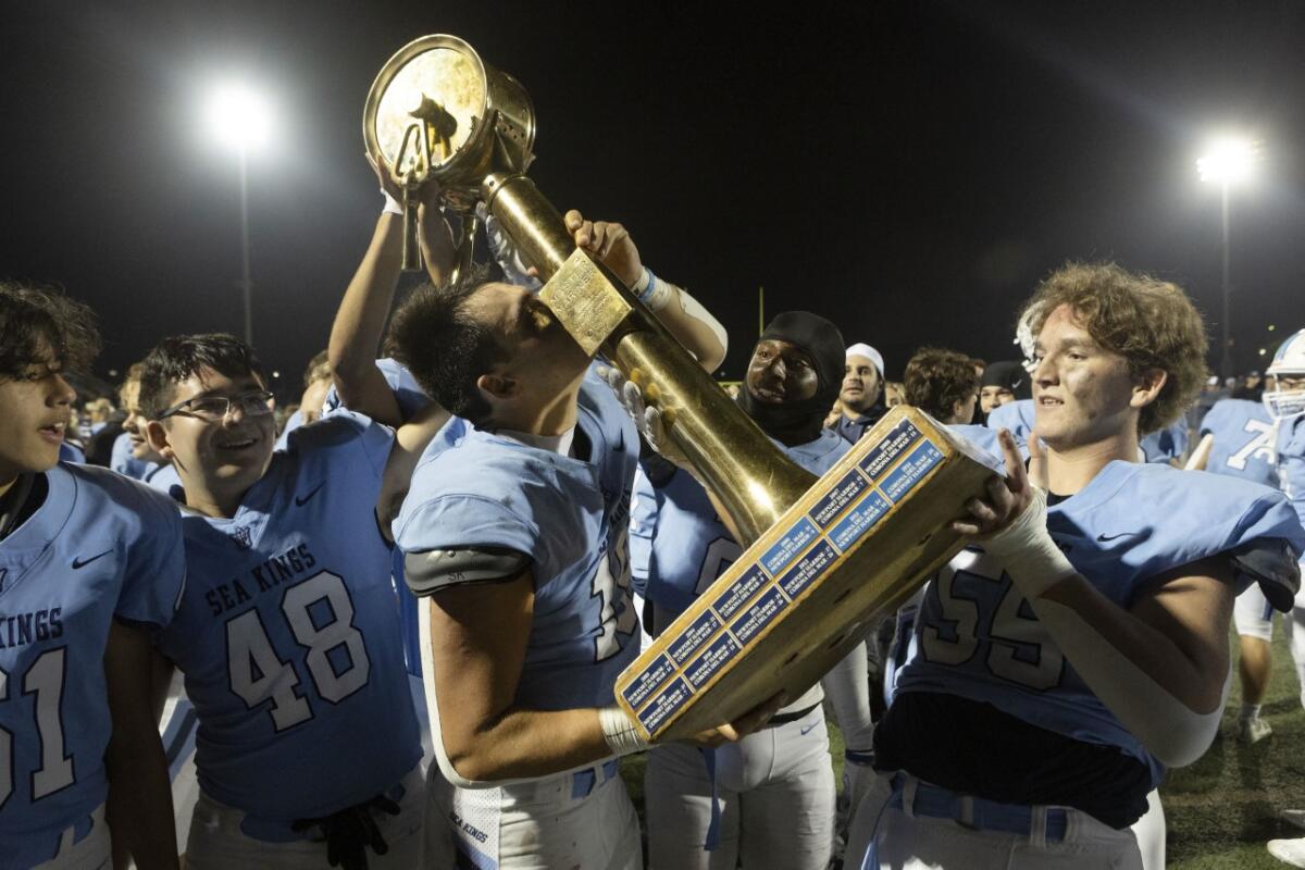 Corona del Mar's David Rasor celebrates after defeating Newport Harbor in the Battle of the Bay game on Friday.