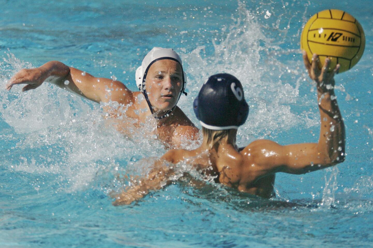 CV's Andrew Lockwood, left, blocks a pass from Pasadena Poly's Chris McWilliams during a match at Pasadena Poly on Tuesday, September 25. 2012.