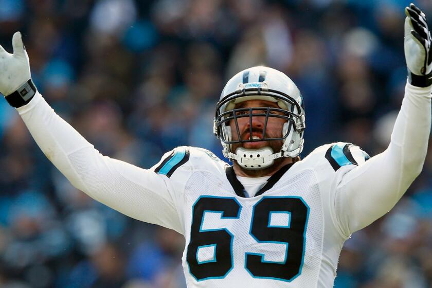 Carolina Panthers defensive end Jared Allen celebrates during the second quarter of the NFC Divisional Playoff Game against the Seattle Seahawks on Sunday.