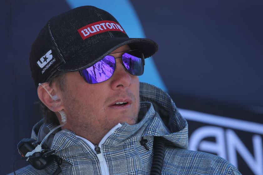 US snowboarding coach Peter Foley looks on during the a 2011 LG Snowboard-Cross FIS World Cup race