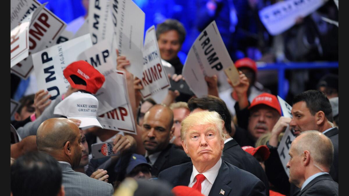 Donald Trump with supporters at the rally.