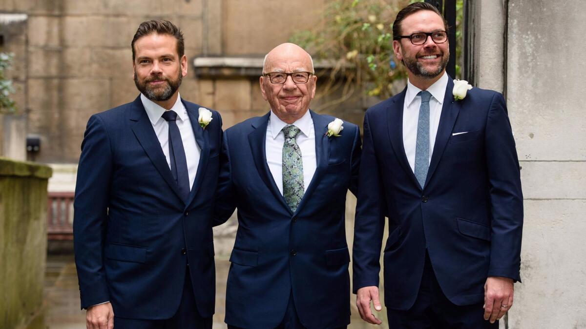 Lachlan Murdoch, Rupert Murdoch and James Murdoch in March 2016 at Rupert Murdoch's wedding to his fourth wife