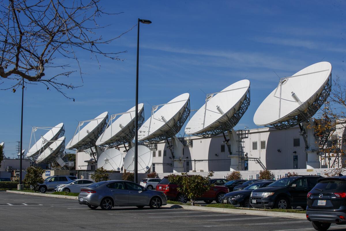 A view of DirecTV satellite dishes at AT&T Los Angeles Broadcast Center in Culver City on Jan. 31.