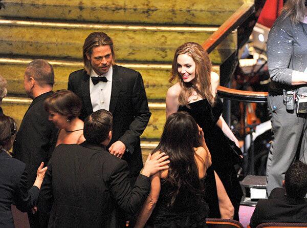 Ever-popular red carpet couple Brad Pitt and Angelina Jolie arrive on Sunday.