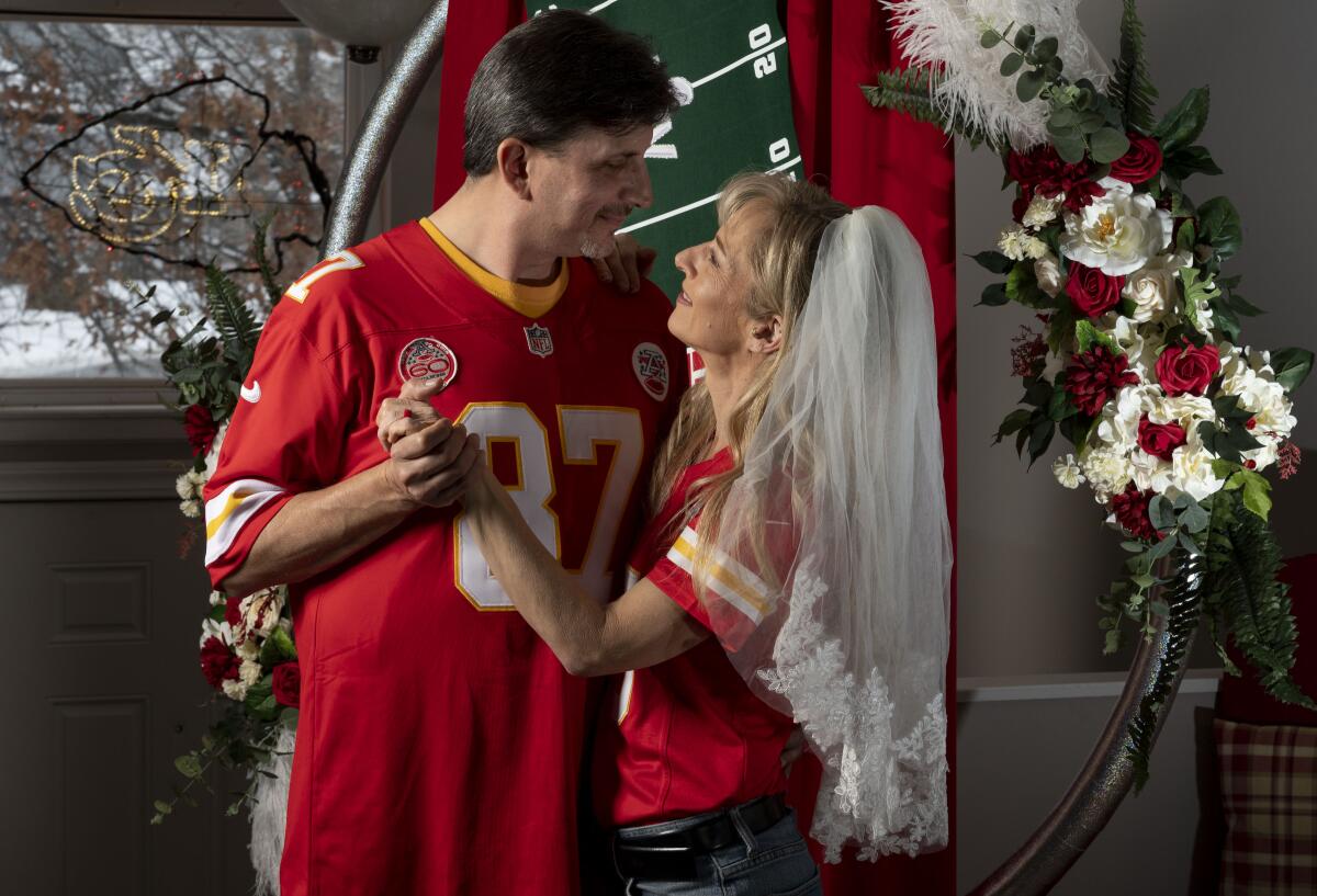 Rob Walkowiak and Nikki Bailey picked their wedding date, 0202 2020, because it is a palindrome. At the time, so far in advance, they didn’t realize it was Super Bowl Sunday. 