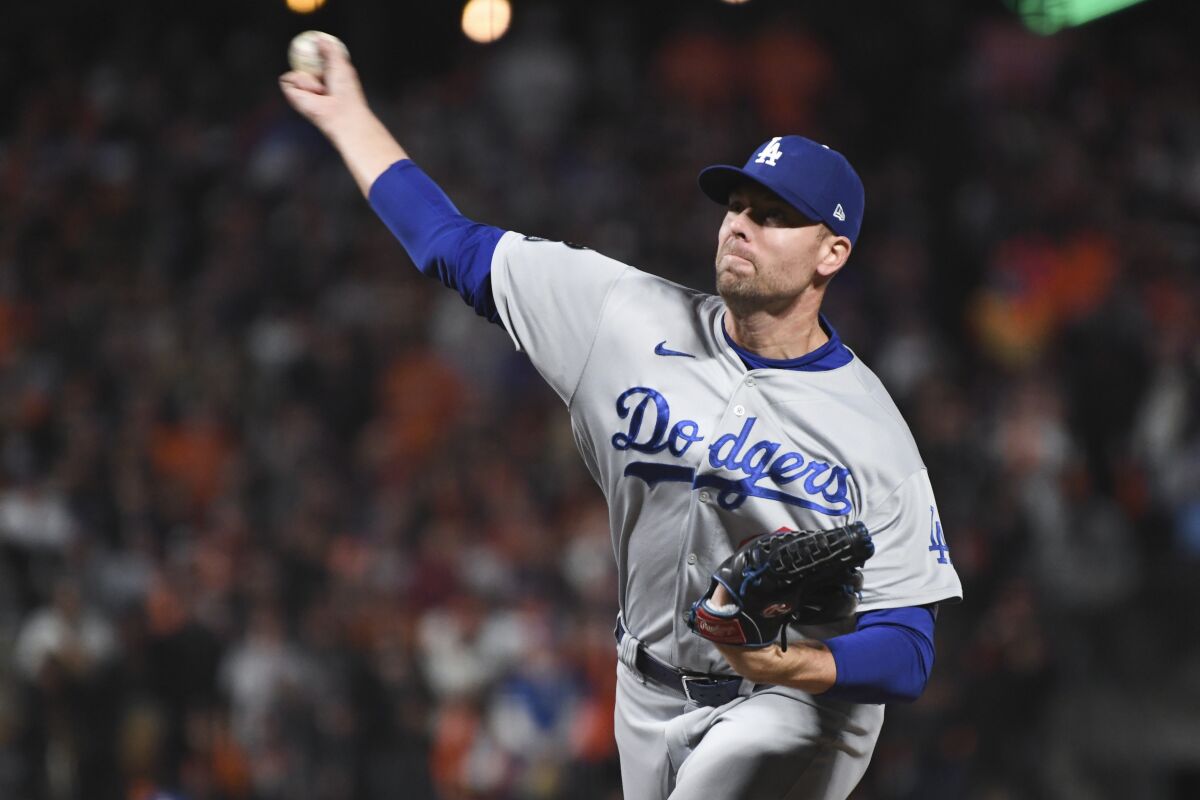 Dodgers relief pitcher Blake Treinen delivers during the seventh inning in Game 5.