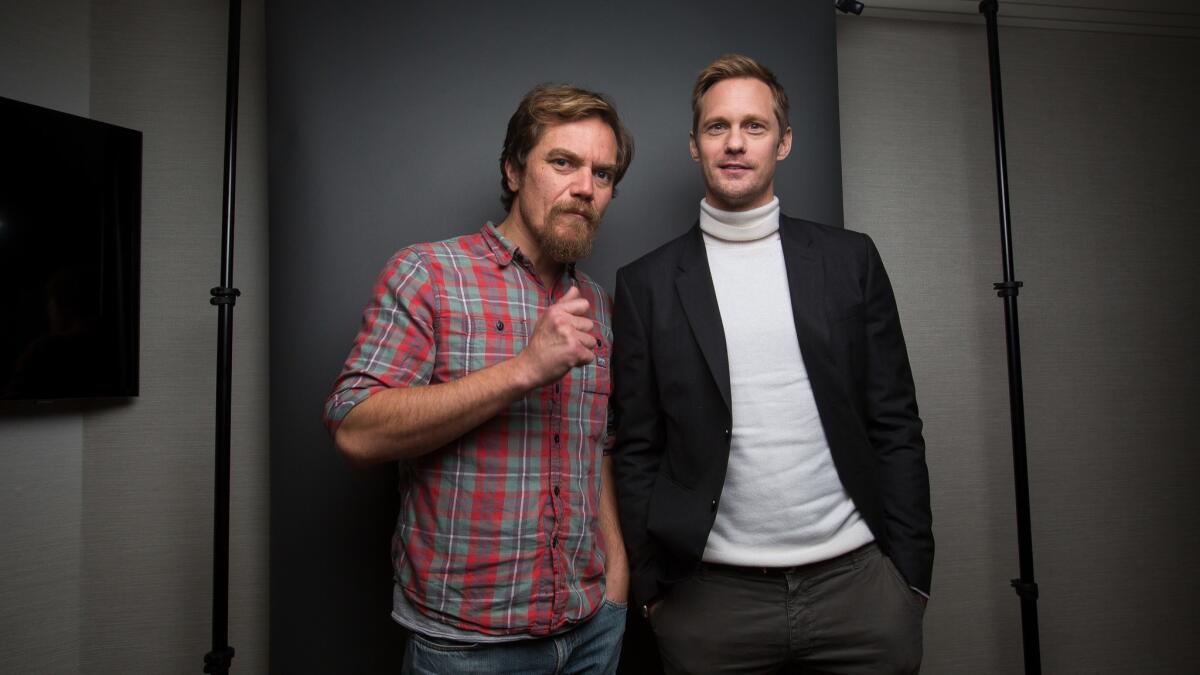 Michael Shannon and Alexander Skarsgard pose for a portrait in New York on Nov. 6.