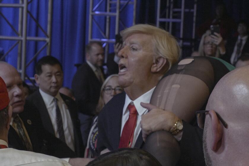 Sacha Baron Cohen, dressed as President Trump, in the movie "Borat Subsequent Moviefilm."