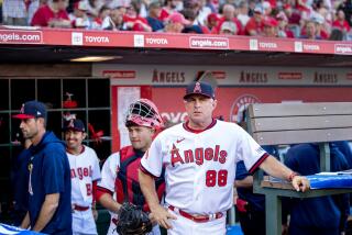 Anaheim, CA - July 21: Angels manager Phil Nevin waits for the game to start with the Pirates at Angel Stadium.