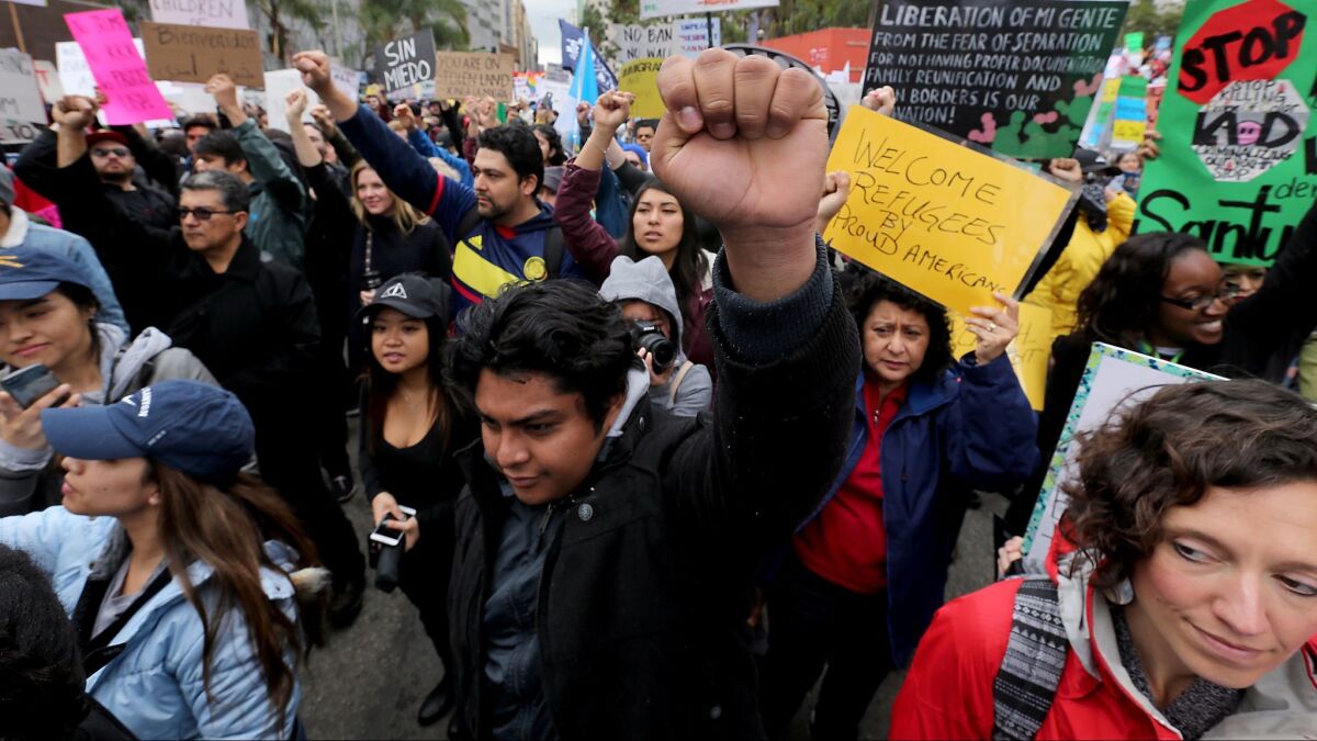 Protesters in downtown Los Angeles during a march last year against President Trump's immigration policies.