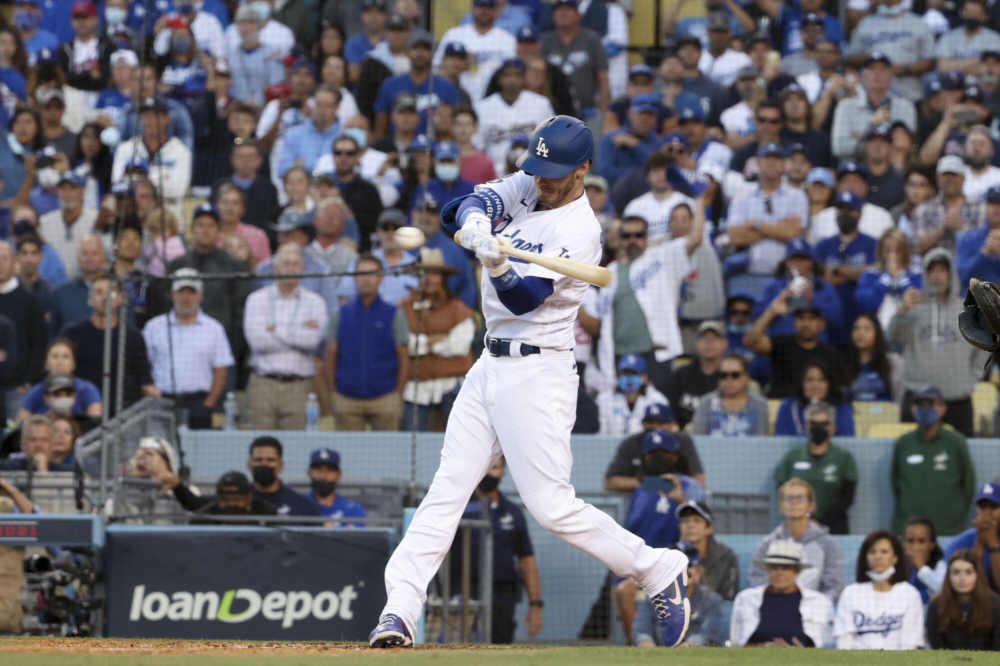 Los Angeles Dodgers' Cody Bellinger hits a three-run home run to tie the score during the eighth inning.