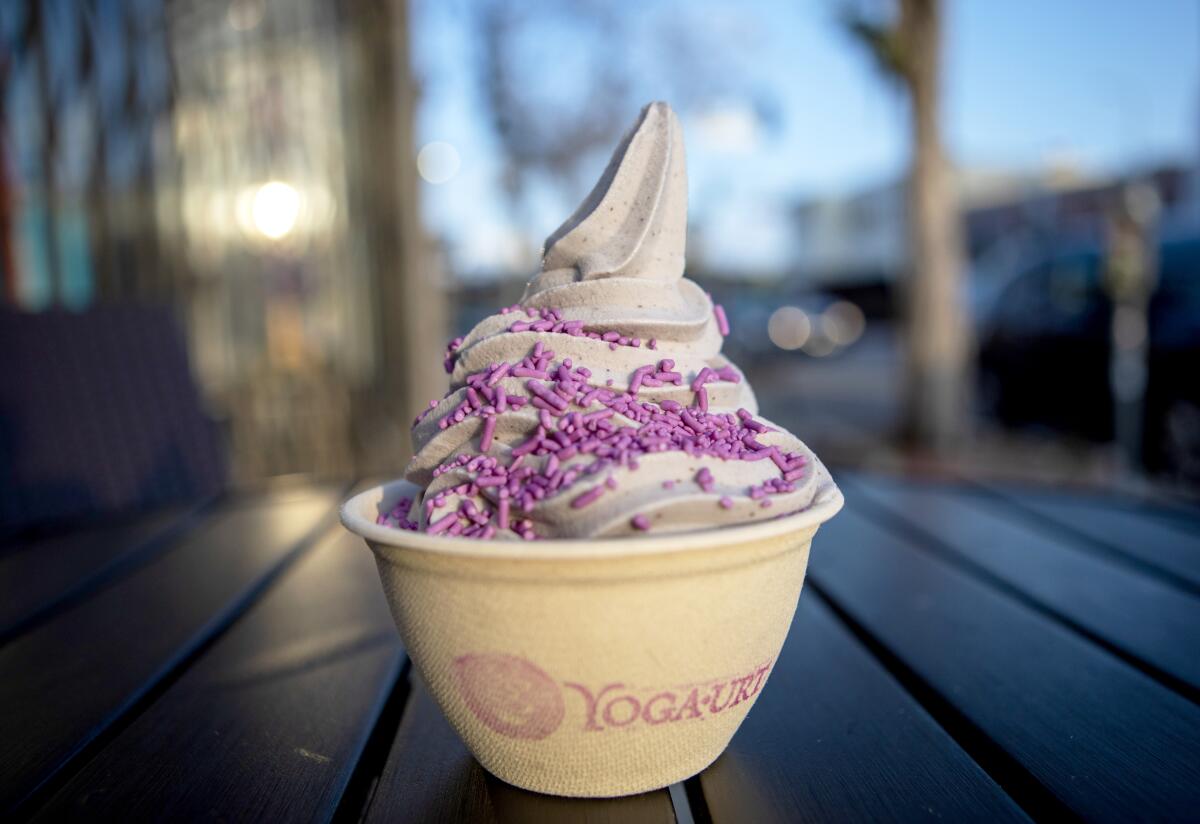 A soft-serve swirl at Yoga-urt topped with lavender-colored sprinkles.
