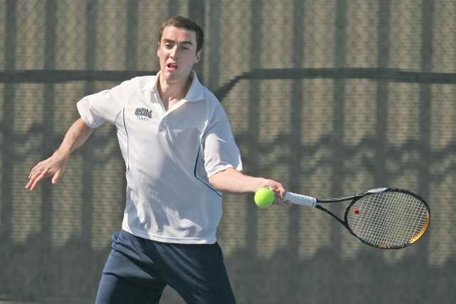 Corona del Mar's Carter Wheatley hits a forehand shot during Tuesday's match against Woodbridge.