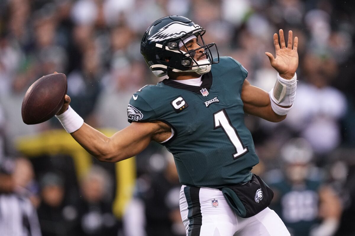 Philadelphia Eagles quarterback Jalen Hurts passes during the first half of the NFC championship game.