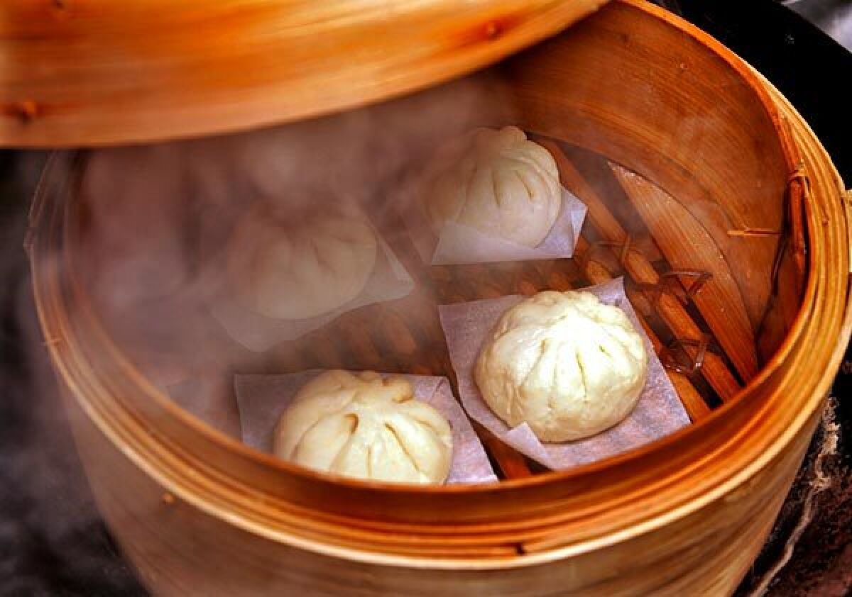 Freshly steamed homemade bao, filled with fragrant roast pork or chicken, has a slightly chewy, flavorful dough.