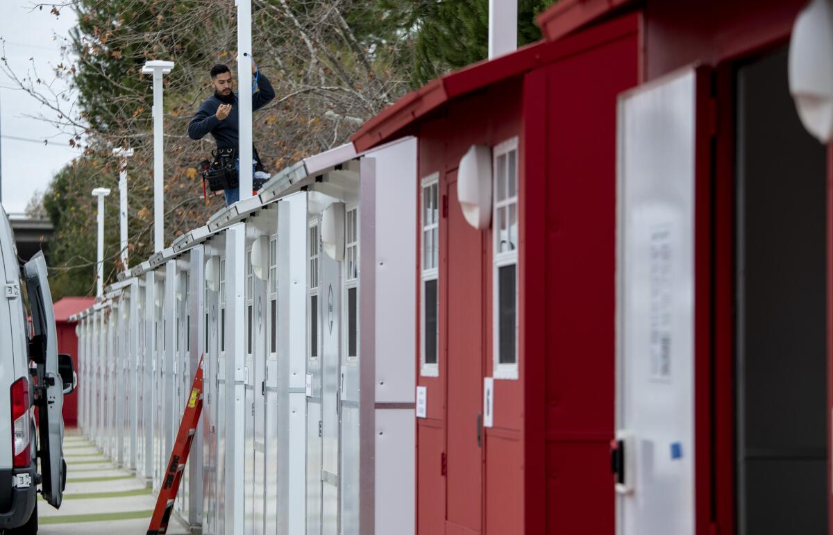 A "tiny homes" community for unhoused residents prepares to open in North Hollywood on Feb. 1, 2021. 