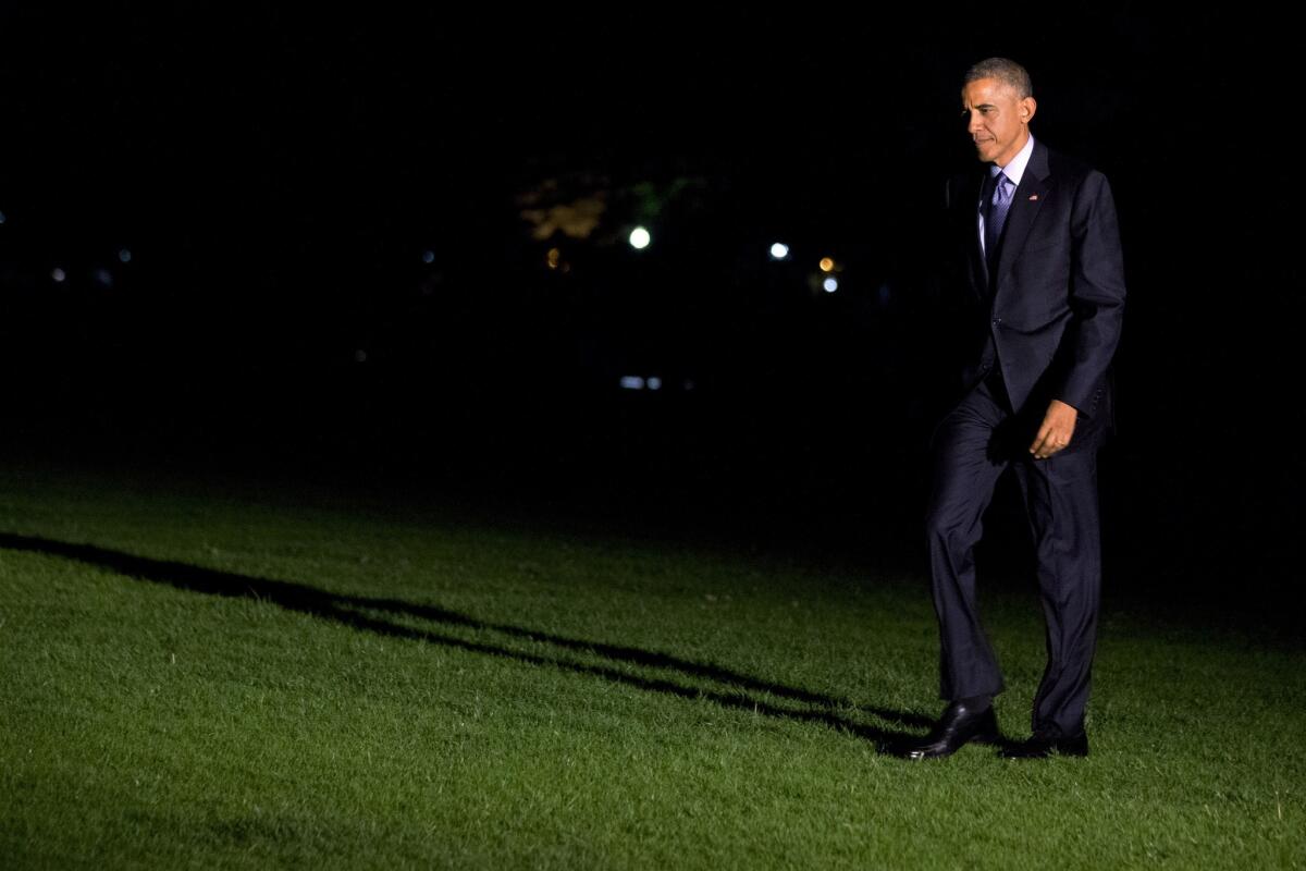 President Obama on the South Lawn of the White House after arriving from a campaign stop in Wisconsin on Tuesday.