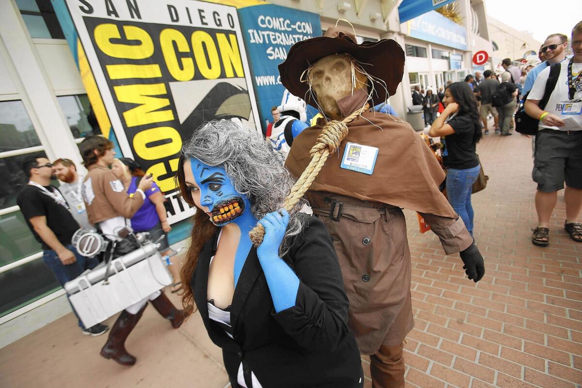 Comic-Con is a summer party where San Diego's downtown is invaded by pop culture fans in zany costumes. Above, Angie Rodriguez, left, and Jonathon Antone are dressed as "Batman" characters during the 2013 convention.