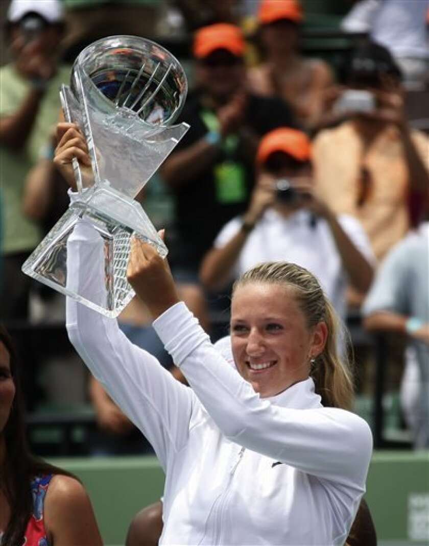 Victoria Azarenka, from Belarus, displays the trophy after defeating Serena Williams 6-3m 6-1 in the women's singles finals at the Sony Ericsson Open tennis tournament in Key Biscayne, Fla., Saturday, April 4, 2009. (AP Photo/J Pat Carter)