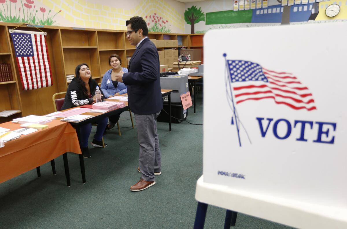 Jimmy Gomez thanks poll volunteers at Sheridan Street School in Boyle Heights.