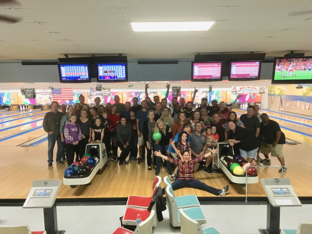 The Optimist Club of Carlsbad recently held a bowling tournament fundraiser to support community youth organizations. The club regularly supports education programs, Boy Scout Eagle Projects, Girl Scouts, homeless youth, high school scholarships, and children in need. Pictured are tournament participants. Visit optimistclubofcarlsbad.org.