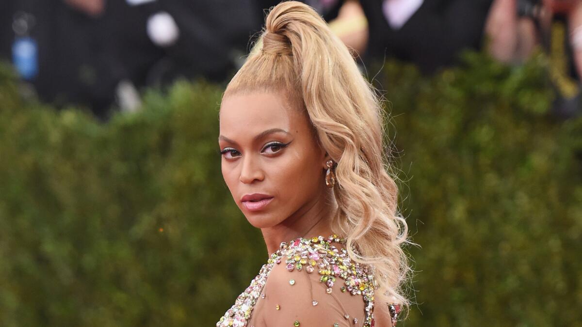 Beyonce's hairstylist says the high ponytail she wore to the Metropolitan Museum of Art's Costume Institute Gala last week was a last-minute change. The event was themed "China: Through the Looking Glass."