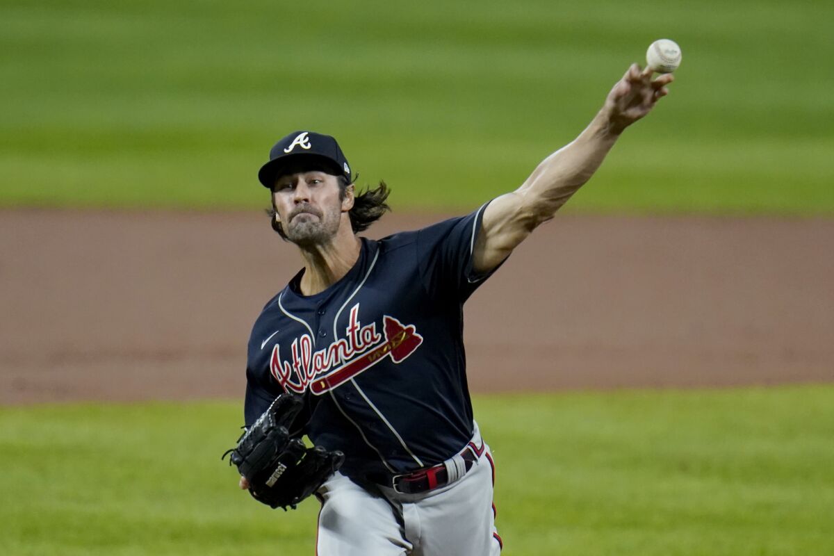 Atlanta Braves starting pitcher Cole Hamels throws a pitch to the Baltimore Orioles during the first inning of a baseball game, Wednesday, Sept. 16, 2020, in Baltimore. (AP Photo/Julio Cortez)