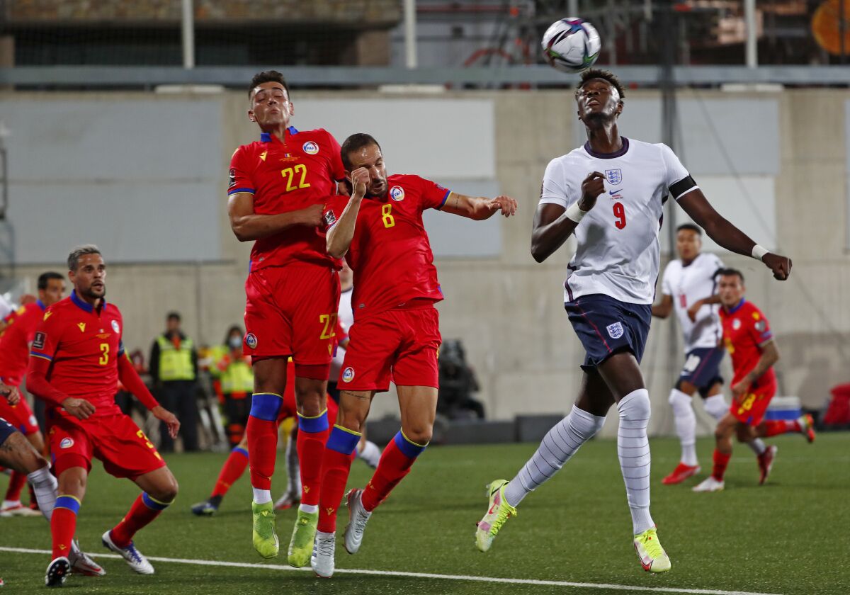 England's Tammy Abraham controls the ball during the World Cup 2022 group I qualifying soccer match between Andorra and England at the National Stadium in Andorra la Vella, Saturday, Oct. 9, 2021. (AP Photo/Joan Monfort)