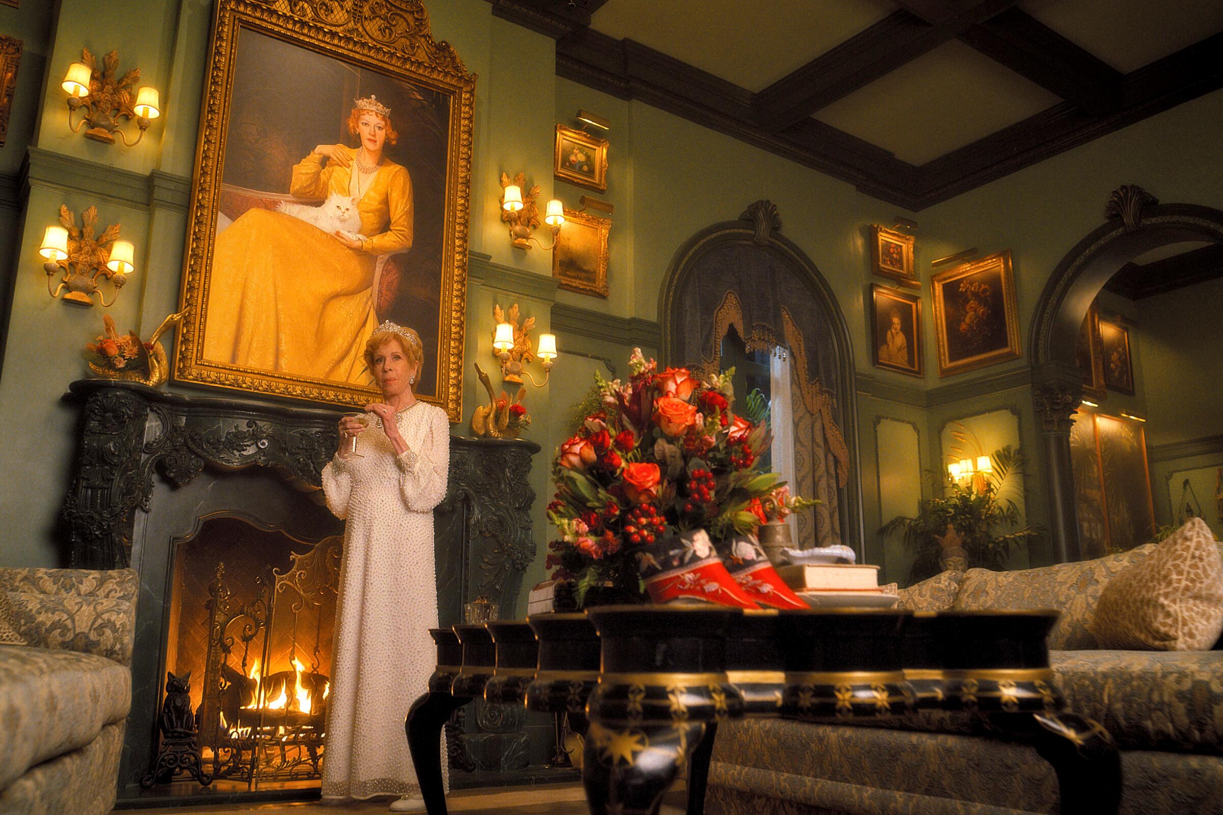 Carol Burnett stands in a large, opulent room in "Palm Royale."