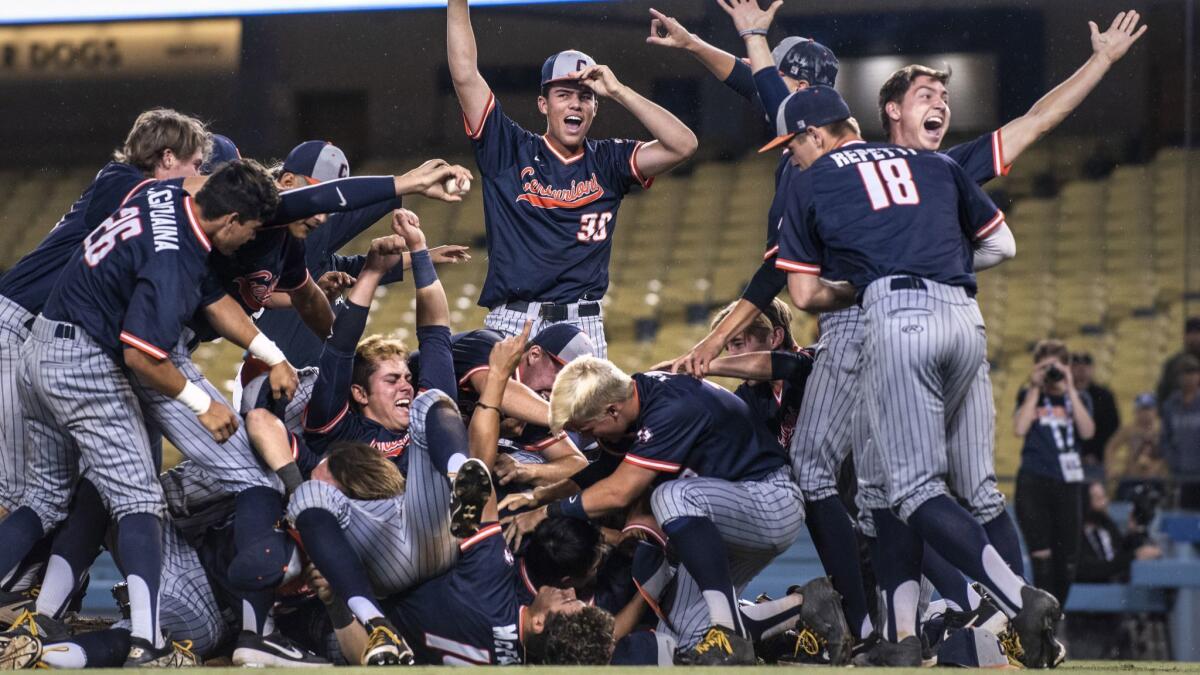 Cypress players celebrate after defeating Harvard-Westlake in the Southern Section Division 1 championship baseball game Saturday.