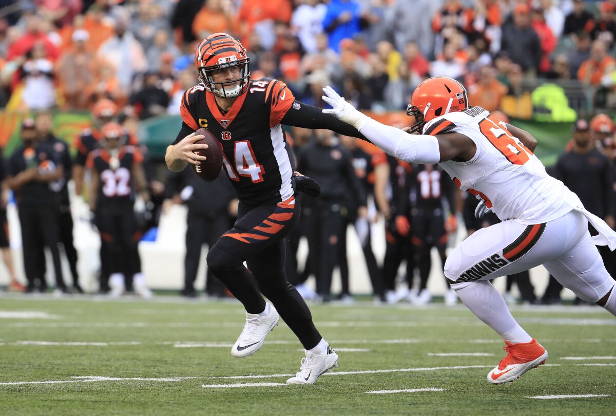 Andy Dalton of the Cincinnati Bengals runs during a game against the Cleveland Browns on Dec. 29.