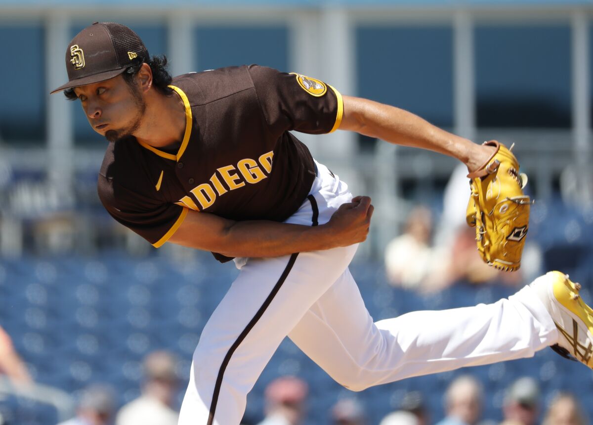 Padres starter Yu Darvish throws against Colorado during a spring-training game March 21 in Peoria, Ariz.