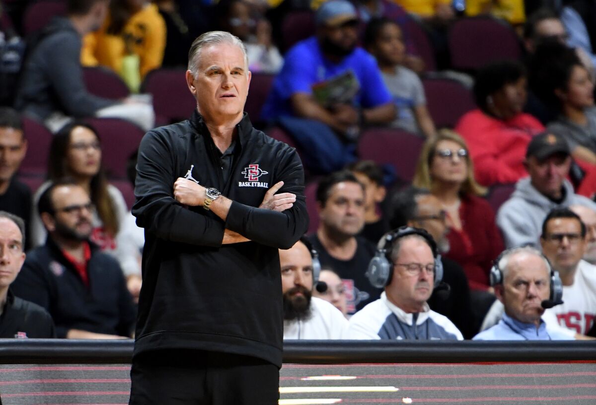 Brian Dutcher assisted legendary San Diego State coach Steve Fisher for 18 years before getting the top job three years ago.