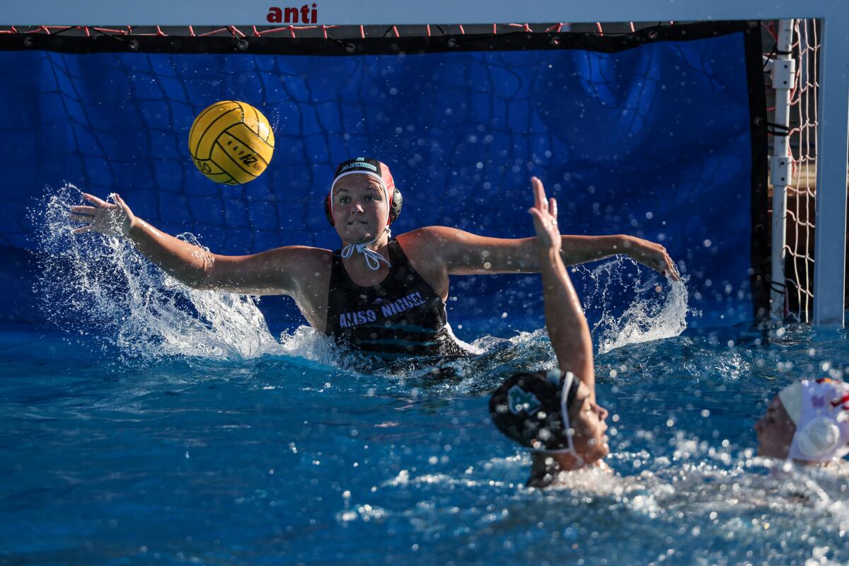 Aliso Niguel High goalie Taylor Kennedy turns away a shot during a match against Mission Viejo.