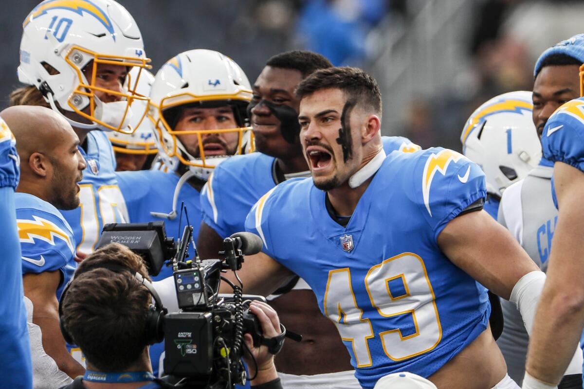 Chargers linebacker Drue Tranquill hypes up his teammates before a win over the Rams in December.
