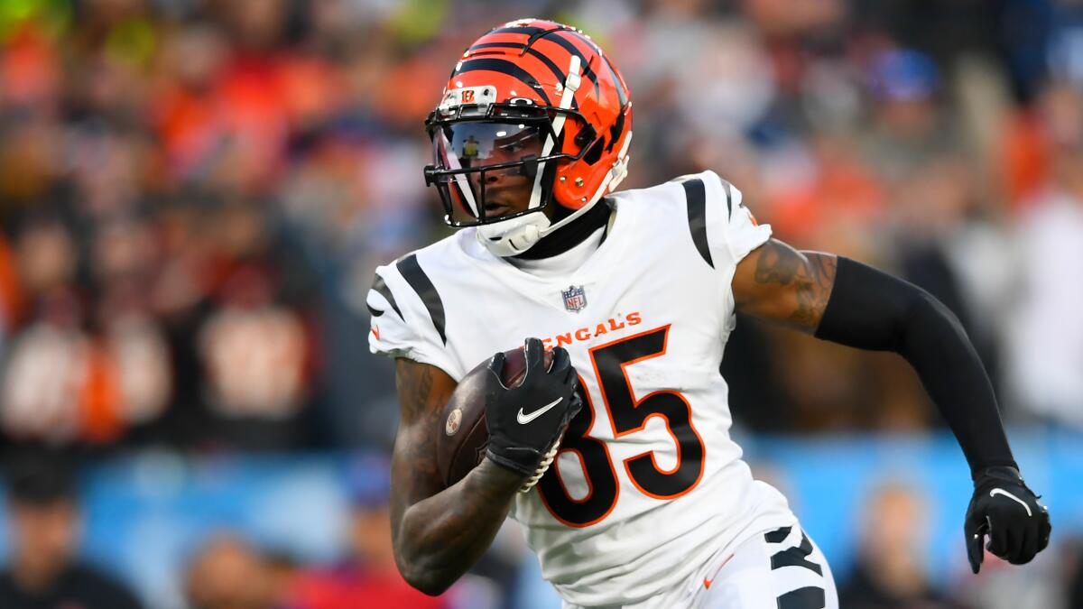 Cincinnati Bengals wide receiver Tee Higgins carries the ball during a playoff win over the Tennessee Titans.