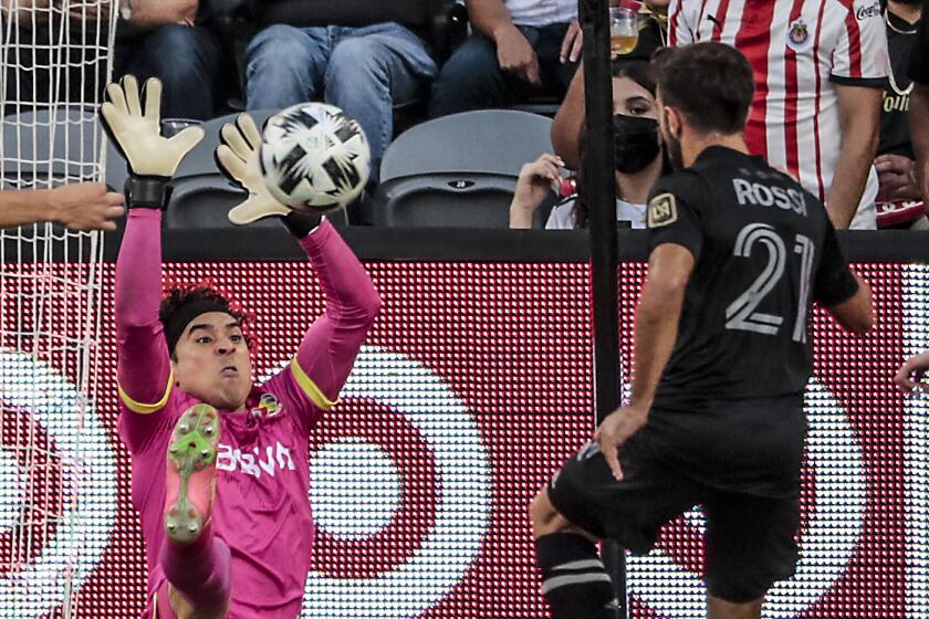 MLS forward Diego Rossi tries to score on Liga MX goalie Guillermo Ochoa during Wednesday's All-Star game.