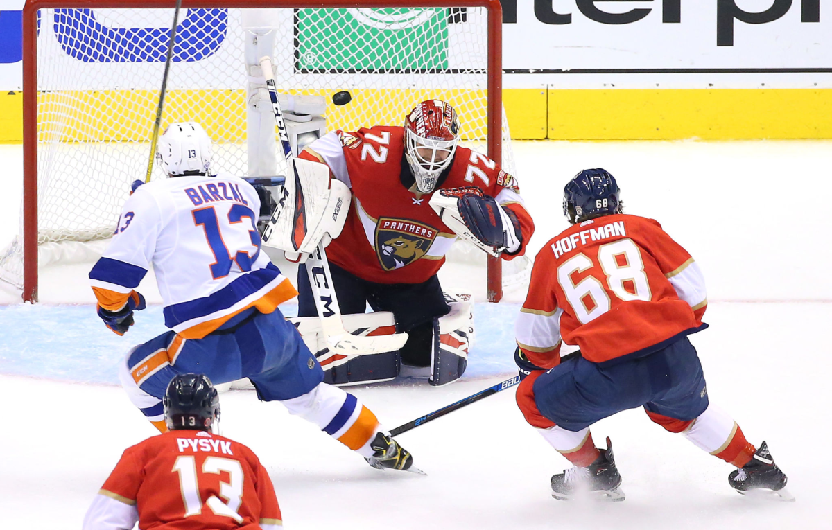 New York Islanders' Mathew Barzal scores as he gets the puck past Florida Panthers goalie Sergei Bobrovsky