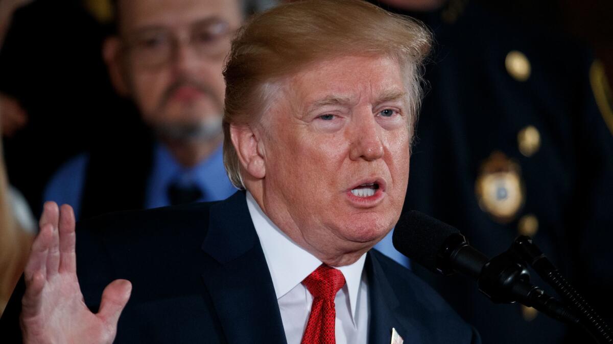 President Donald Trump speaks in the East Room of the White House on Oct. 26.