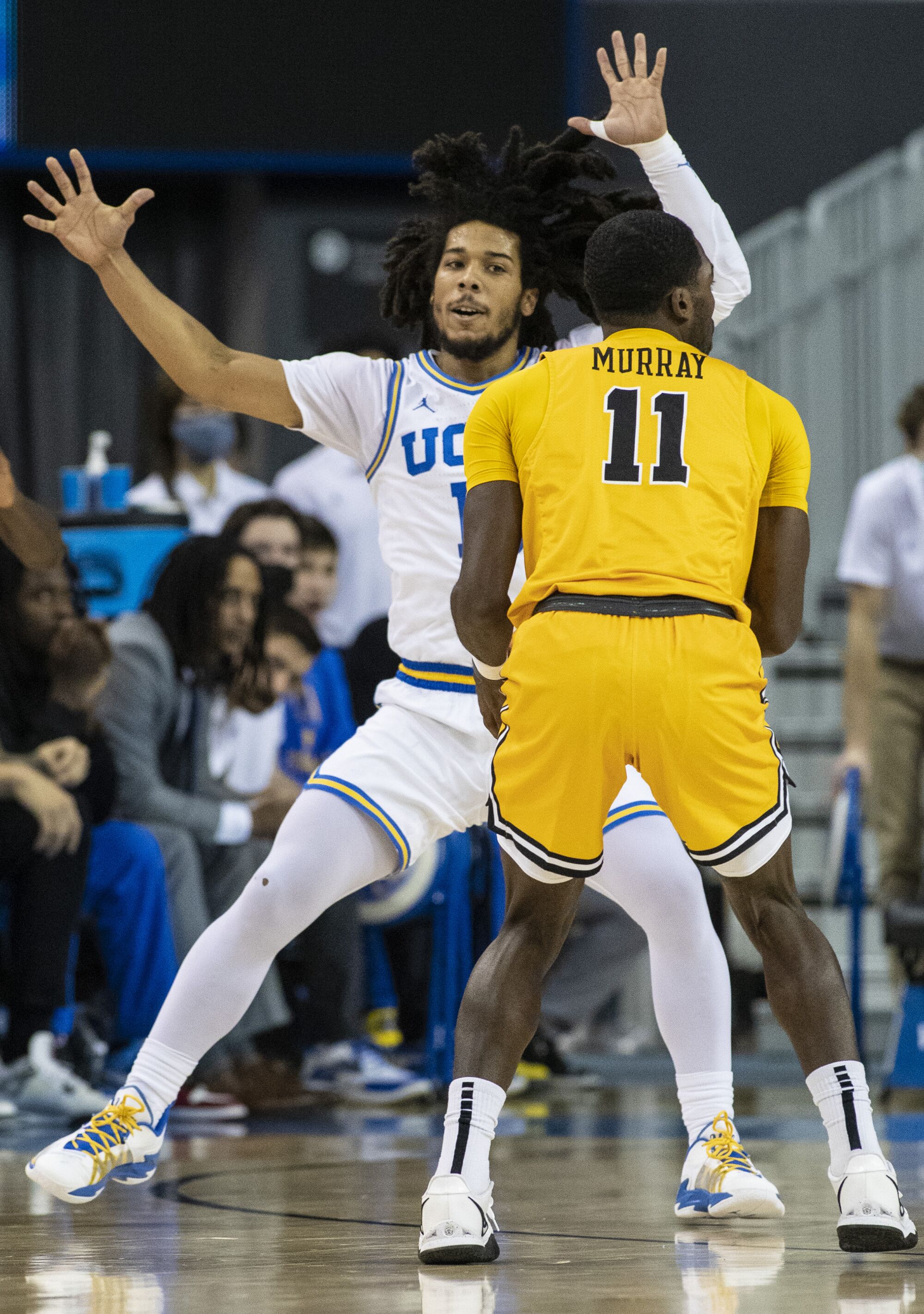 Tyger Campbell guards Long Beach State's Joel Murray on Jan. 6 at Pauley Pavilion.