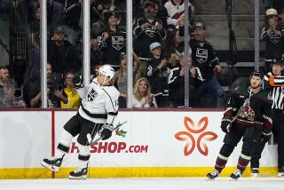 Kings center Trevor Moore celebrates after scoring during a road win over the Arizona Coyotes Monday.