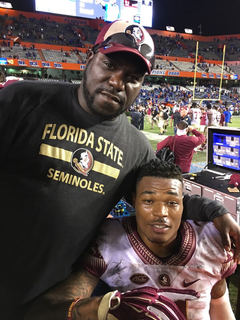 Derwin Sr. and Derwin Jr. after a game when Derwin Jr. was at Florida State.